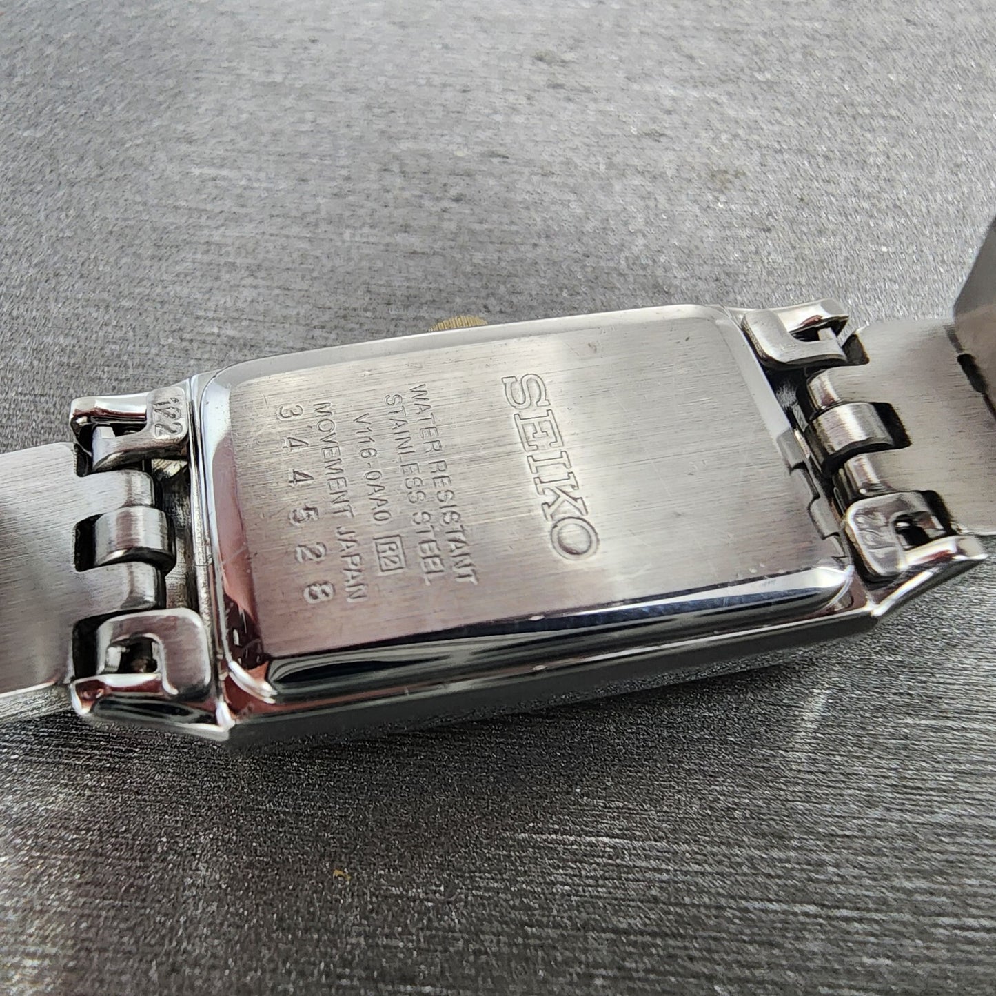 Seiko Solar Tank Watch Women 16mm White Dial Two Tone Rectangle V1160AA0 Runs9