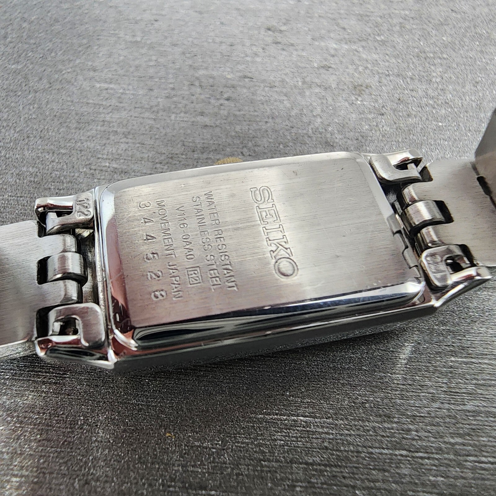 Seiko Solar Tank Watch Women 16mm White Dial Two Tone Rectangle V1160AA0 Runs9