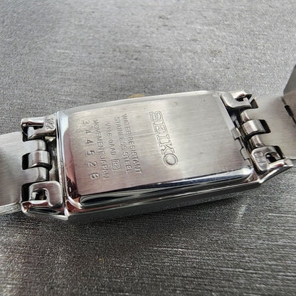 Seiko Solar Tank Watch Women 16mm White Dial Two Tone Rectangle V1160AA0 Runs9