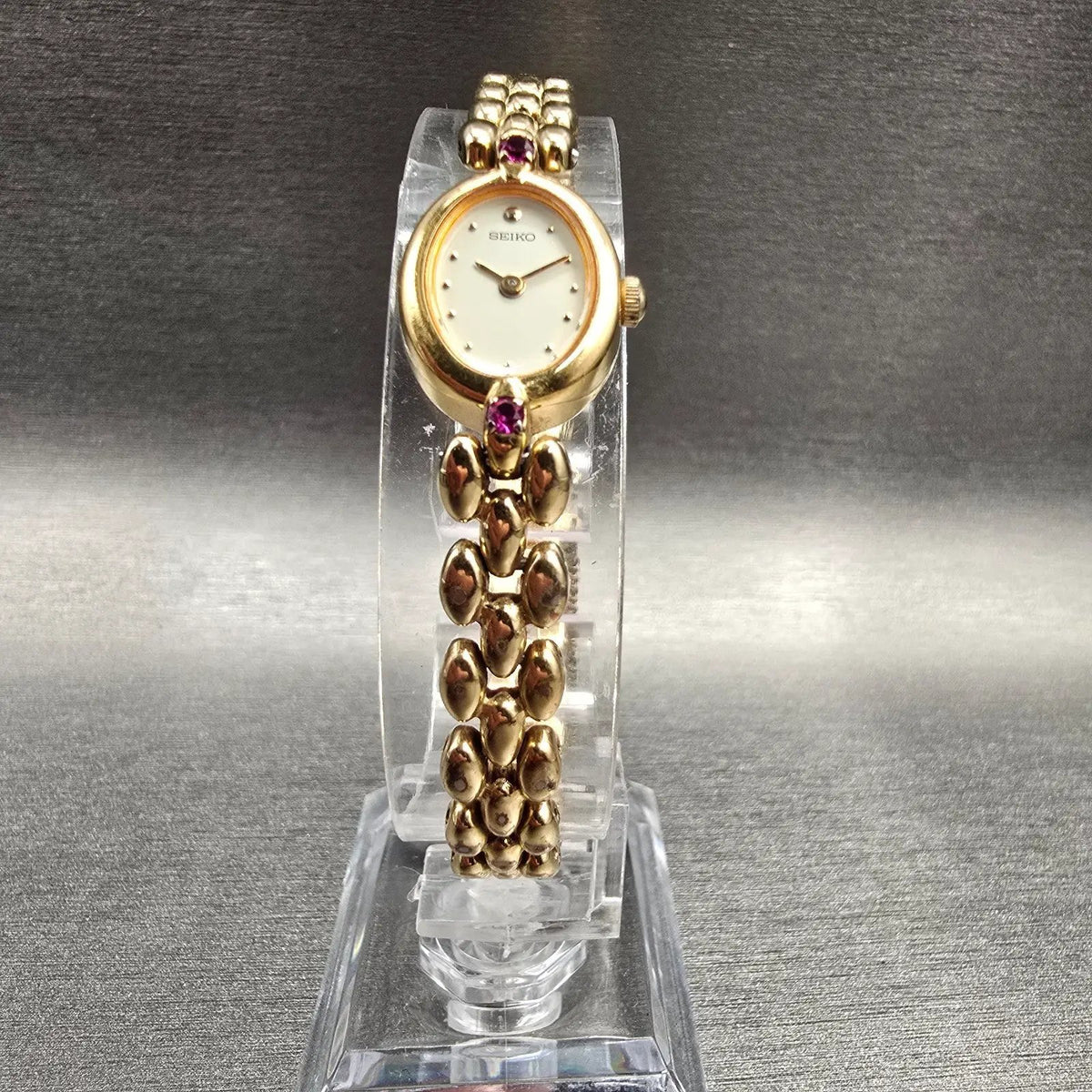 Seiko Watch Women 13mm Ivory Dial Gold Tone Gemmed Oval 1E20-6140 New Battery5