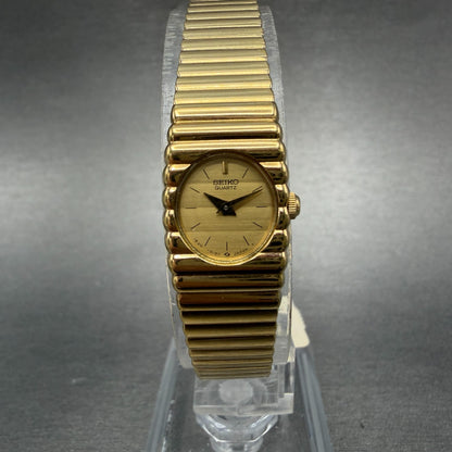 Seiko Watch Women 14mm Gold Dial Gold Tone Rectangle 1E20-5099 New Battery NOS0