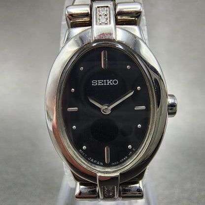 Seiko Watch Women 17mm Black Dial Silver Tone Diamond Accents 1N000KG0 New Batt1
