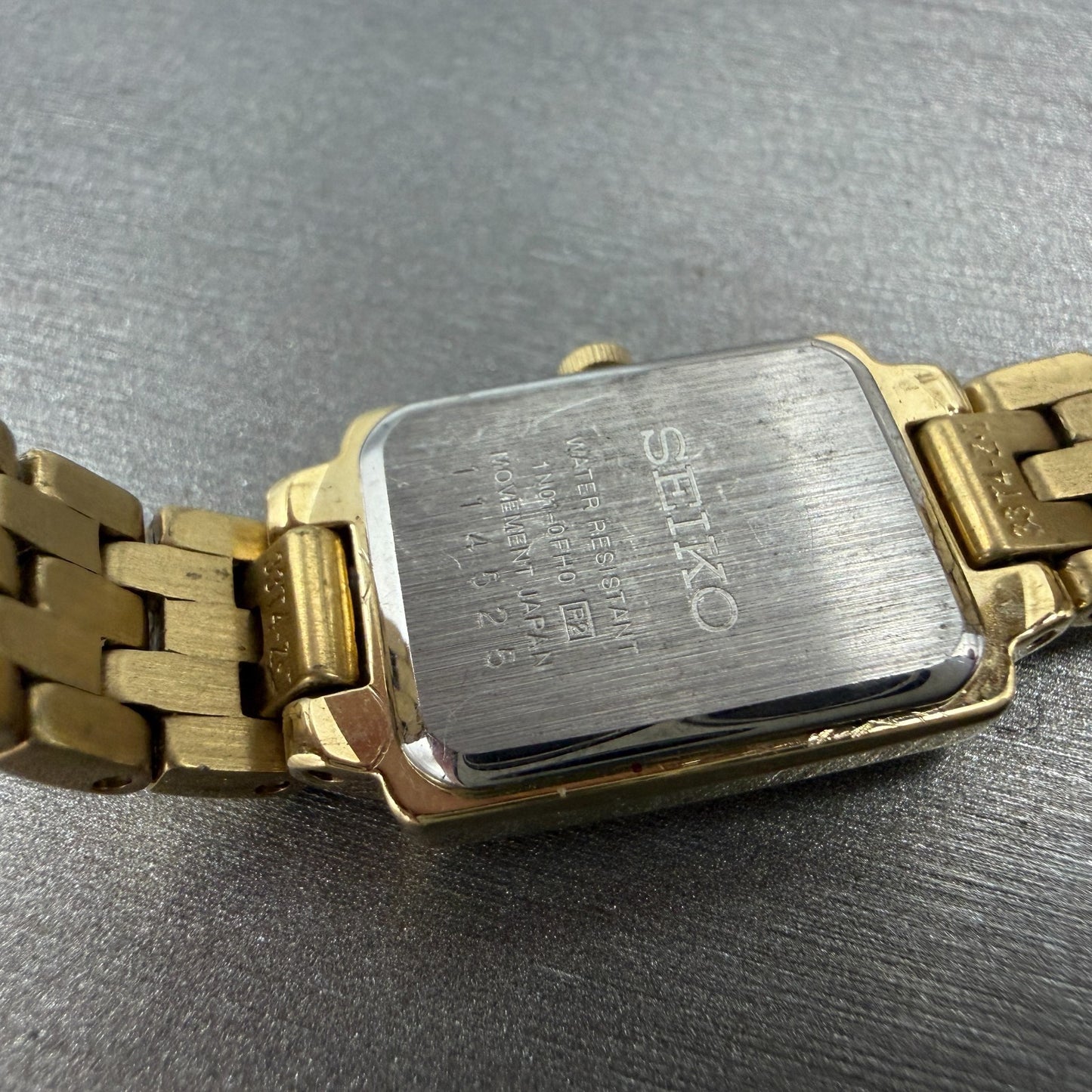 Seiko Tank Watch Women 16mm Champagne Dial Gold Tone 1N01-0FH0 New Battery NHJ9
