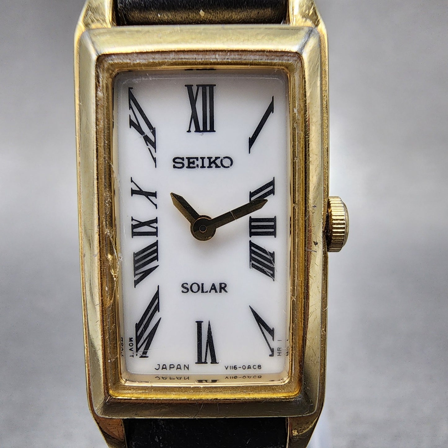 Seiko Solar Tank Watch Women 15mm White Dial Gold Tone Rectangle V1160AA0 Works1
