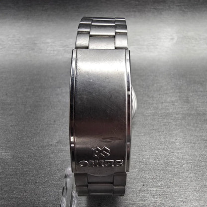 Seiko SQ Watch Men 33mm Silver Dial Silver Tone Daydate Round 5Y23-7110 New Batt7