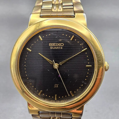 Seiko SX Watch Men 33mm Black Dial Gold Tone Round V701-1K00 New Battery Vintage1
