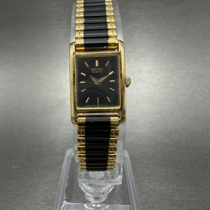 Seiko Tank Watch Women 14mm Black Dial Gold Tone Rectangle 1F20-5A69 New Batt TH0