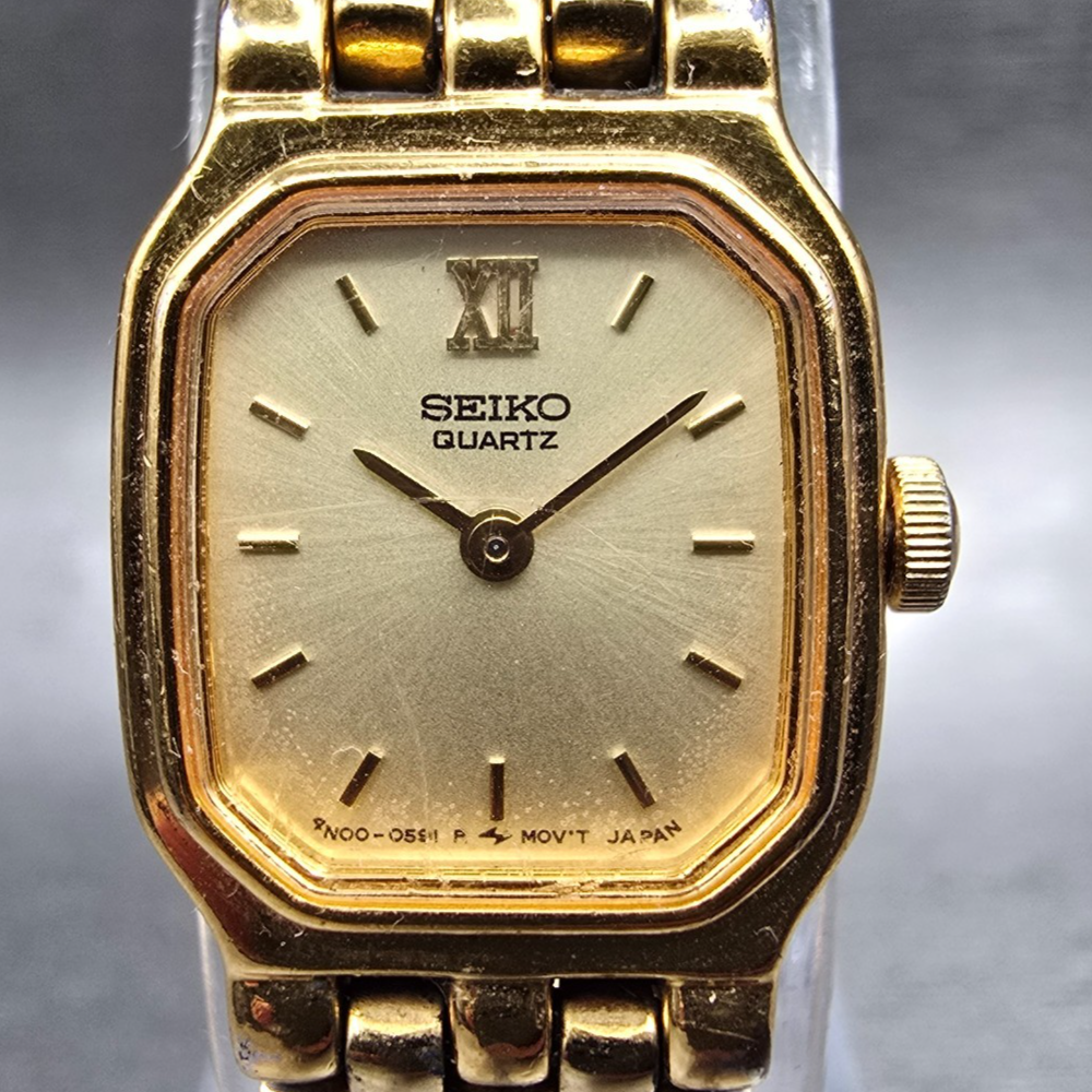 Seiko Watch Women 16mm Champagne Dial Gold Tone Rectangle 4N00-5249 New Battery1
