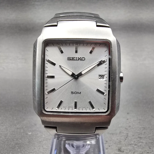 Seiko Watch Men 32mm Silver Dial Silver Tone Date Rectangle 7N32-0AL0 New Batt0
