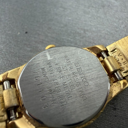 Seiko watch Women 19mm Champagne Dial Gold Tone Round V401-1819 New Battery HJ89