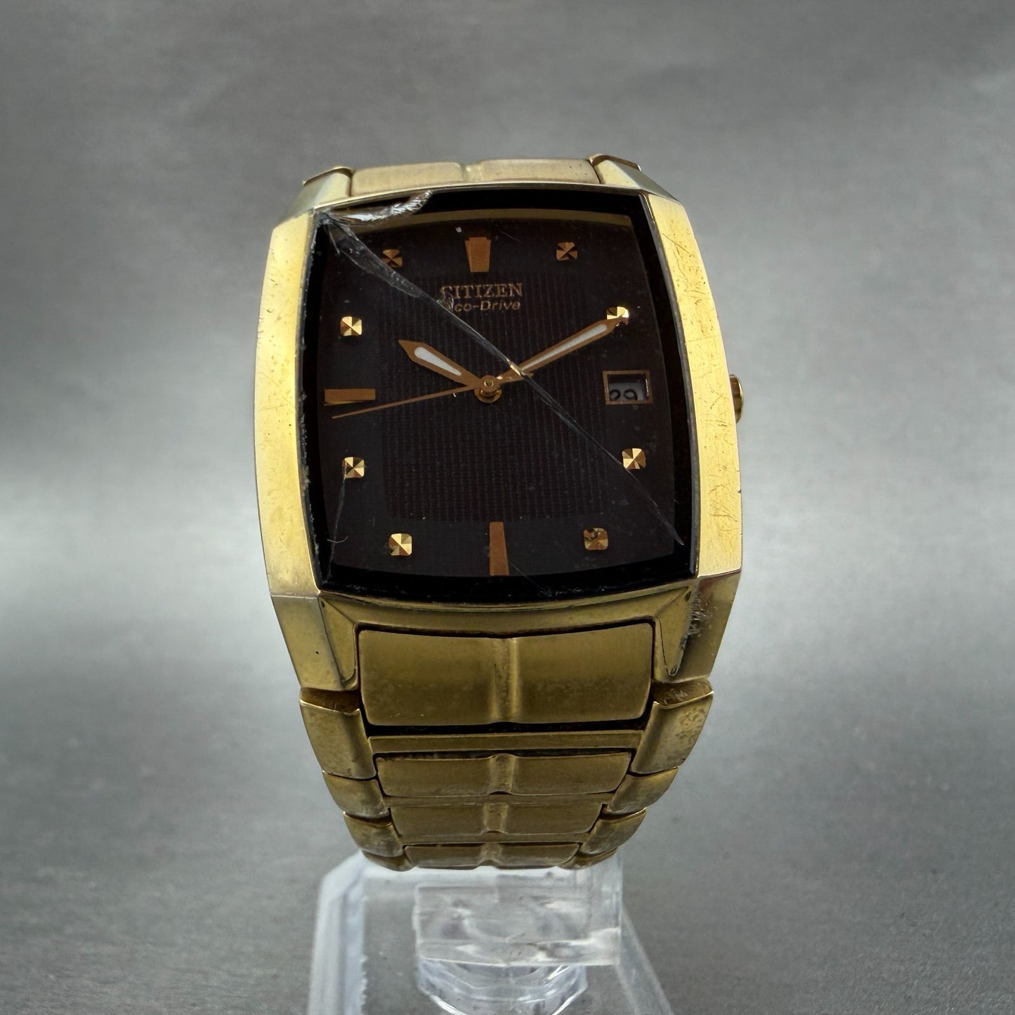 Citizen Eco-Drive Tank Watch Men 31mm Black Dial Gold Tone Date E111-S049369 Run5