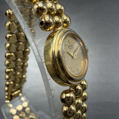 Seiko Watch Women 16mm Champagne Dial Gold Tone Round 1E20-0329 New Battery3