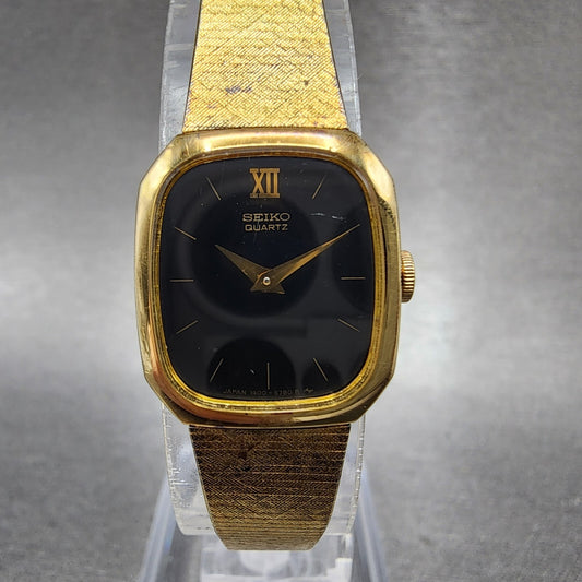 Seiko Watch Women 17mm Black Dial Gold Tone Rectangle 1400-8149 New Battery VTG