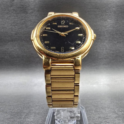 Seiko Watch Men 35mm Black Dial Gold Tone Round V701-2F30 New Battery Vintage JP5