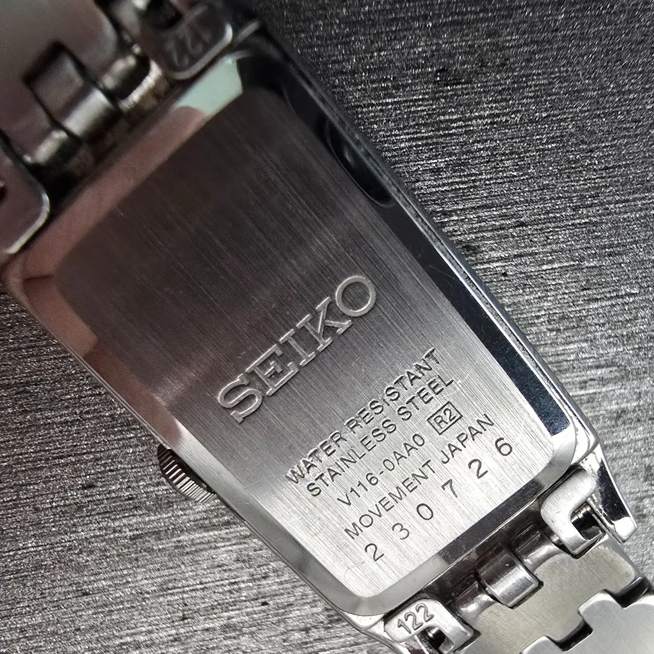 Seiko Solar Tank Watch Women 15mm Black Dial Silver Rectangle V116-0AA0 Works10