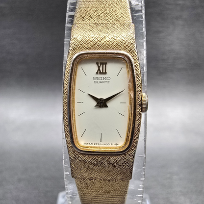 Seiko Watch Women 13mm Ivory Dial Gold Tone Rectangle 2E20-6139 New Battery0