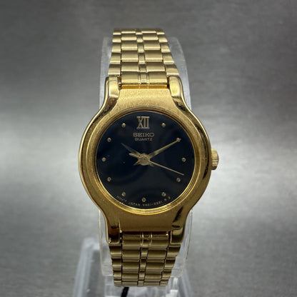 Seiko Watch Women  19mm Black Dial Gold Tone Round V4010099 New Batt NOS W/Box1