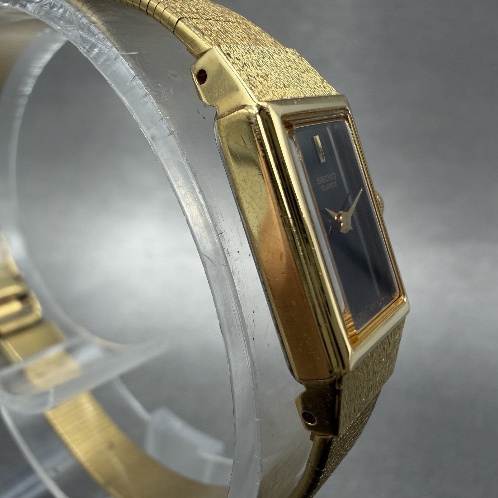 Seiko Tank Watch Women 12mm Black Dial Gold Tone 2E20-6479 New Battery VTG ABC3
