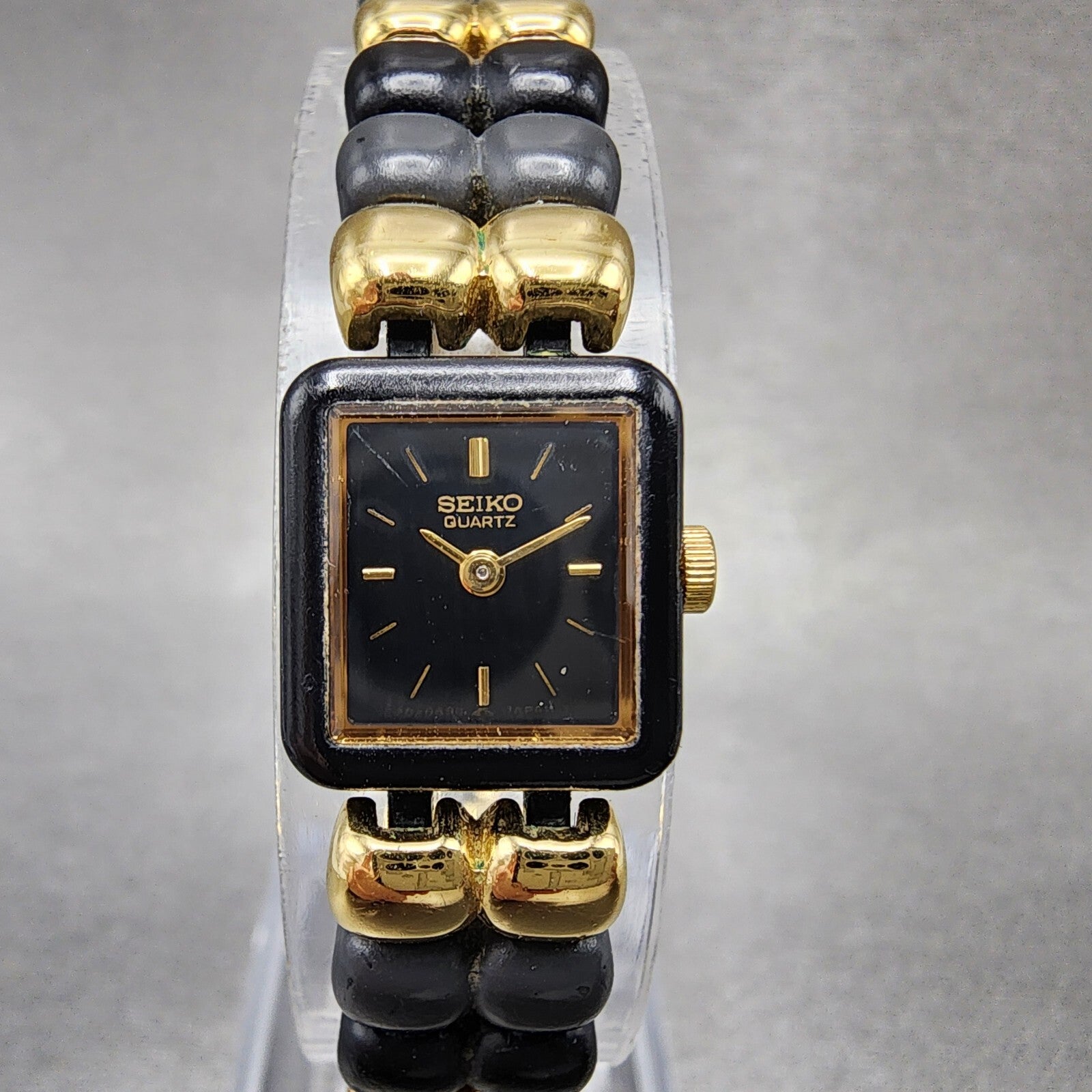 VTG Seiko Watch Women 14mm Black Dial Black Tone Rectangle 1E205540 New Battery0