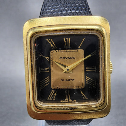 Movado Tank Watch Women 22mm Black & Gold Dial Gold Tone Rectangle New Battery1