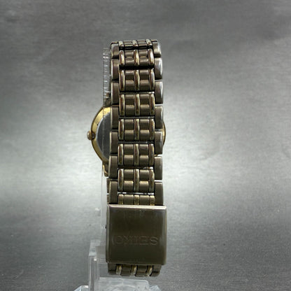 Seiko Watch Women 27mm Champagne Dial Gold Tone Date Round 7N82-0131 New Battery7