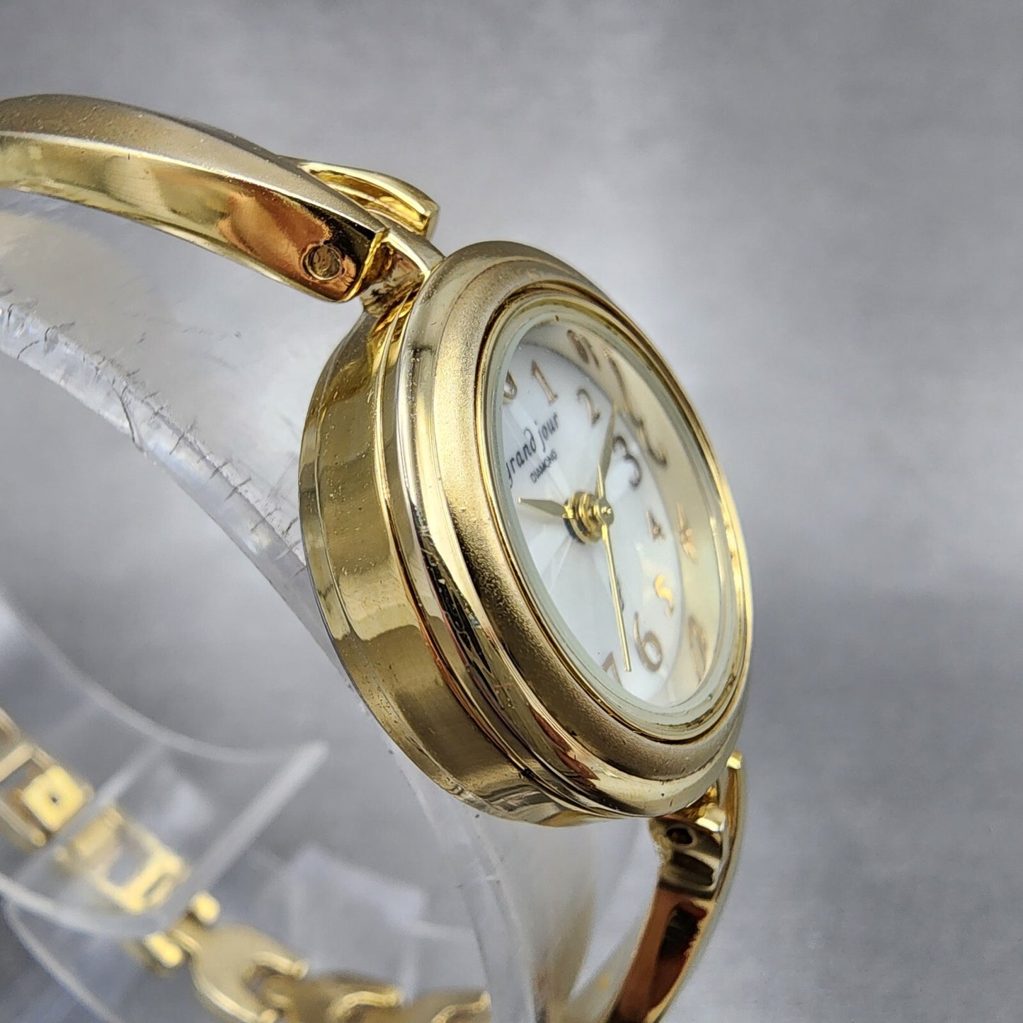 Grand Jour Interchangeable Bezel Watch Women 22mm MOP Dial Gold Tone New Battery5