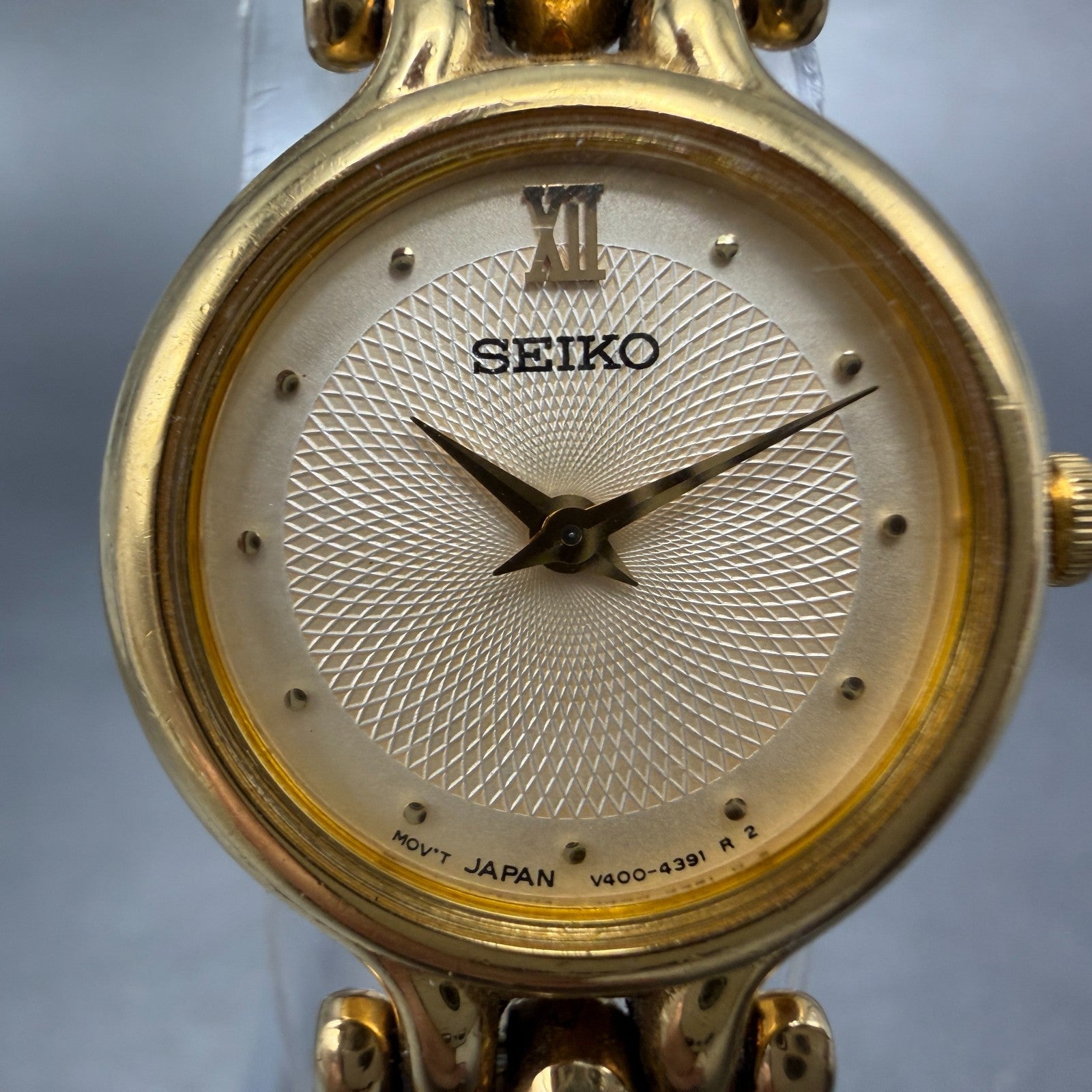 Seiko Watch Women 21mm Champagne Dial Gold Tone Round V400-1229 New Battery1