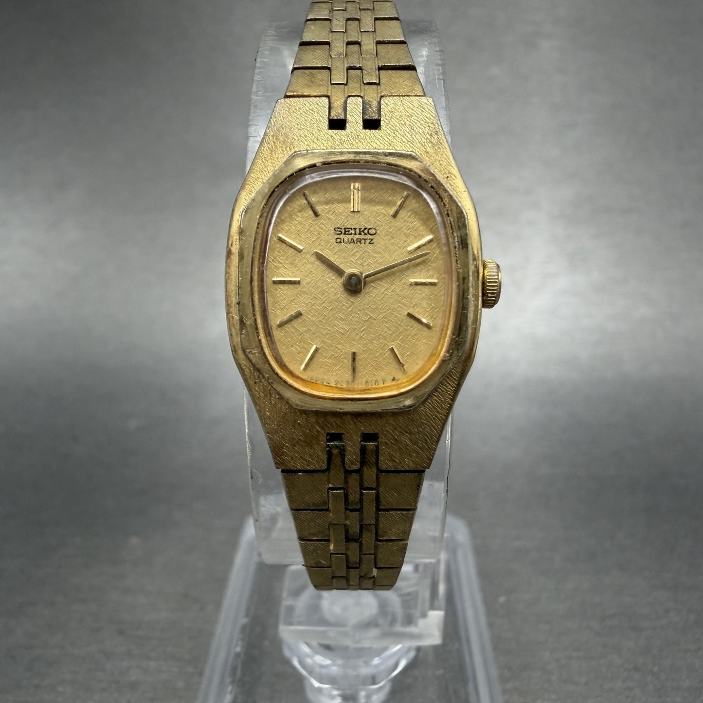 Seiko Watch Women 17mm Champagne Dial Gold Tone Rectangle 2C20-5749 New Batt ABD0