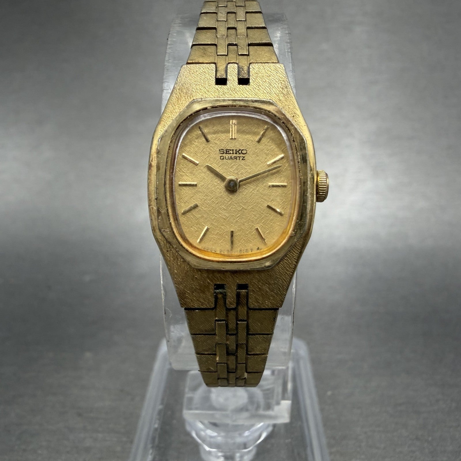 Seiko Watch Women 17mm Champagne Dial Gold Tone Rectangle 2C20-5749 New Batt ABD0