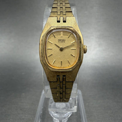 Seiko Watch Women 17mm Champagne Dial Gold Tone Rectangle 2C20-5749 New Batt ABD0
