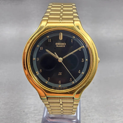 Seiko SX Watch Men 34mm Black Dial Gold Tone Round V701-6J60 New Battery Vintage0