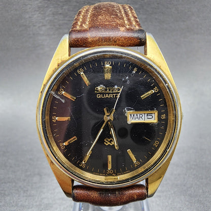 Seiko SQ Watch Men 35mm Black Dial Gold Tone Daydate Round 5Y238A19 PARTS0