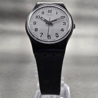 Swatch SOMETHING NEW Watch Women 25mm White Dial Black Case Round LB153 New Batt5