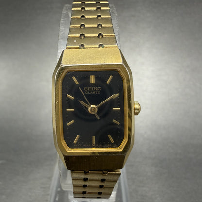 Seiko Tank Watch Women 17mm Black Dial Gold Tone 2Y01-5D20 Rectangle New Battery0