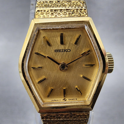 Seiko Watch Women 16mm Chapagne Dial Gold Tone Manual Hexagon 115199 Runs1