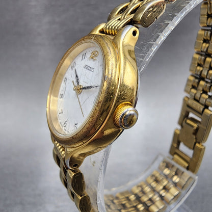 Seiko Watch Women 23mm White Dial Gold Tone Date Round 7N820228 New Battery B122