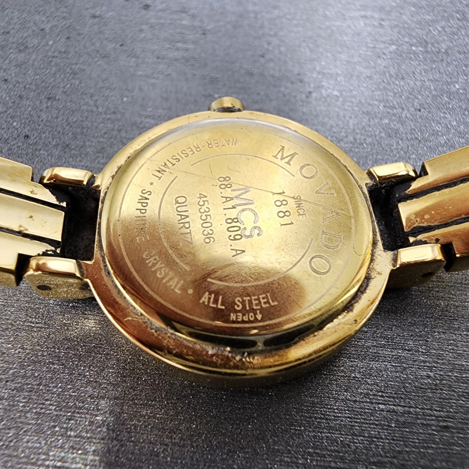 Movado Harmony Watch Women 23mm Black Dial Gold Tone 88.A1.809.A New Battery10