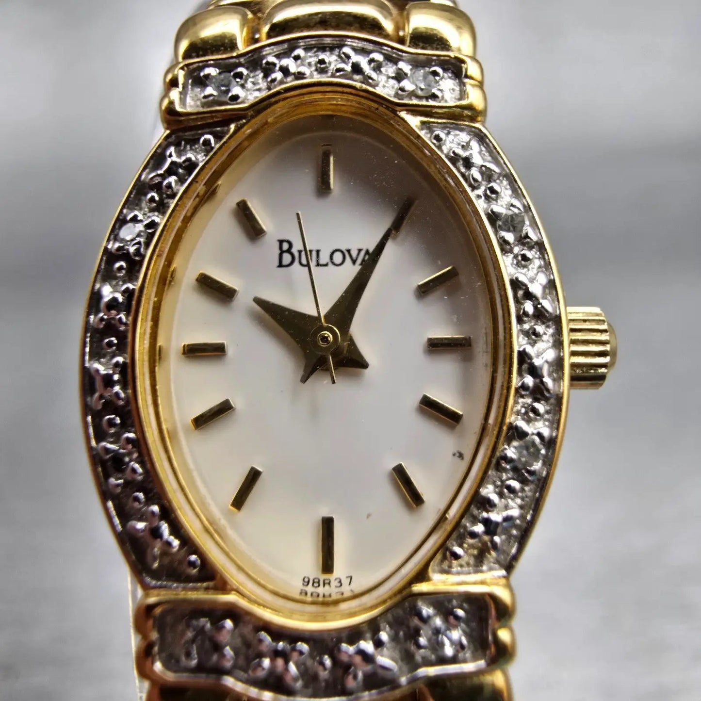Bulova Watch Women 16mm Ivory Dial Gold Tone Gemmed Oval 98R37 New Battery1
