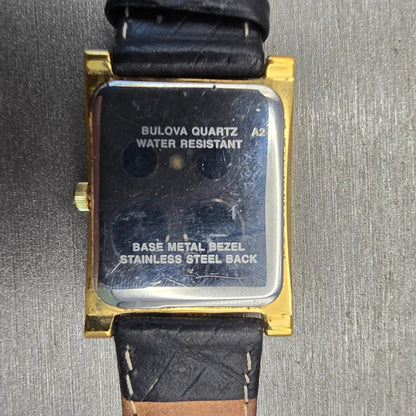 Bulova Watch Men 25mm Black Dial Gold Tone Date Rectangle New Battery 97B42 VTG10