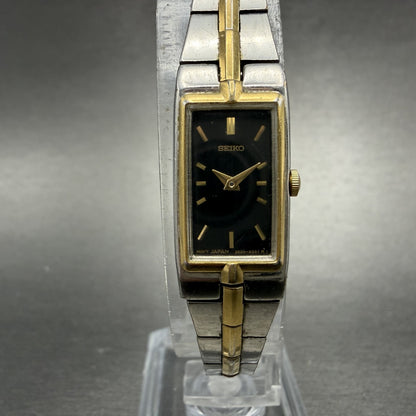 Seiko Tank Watch Women 13mm Black Dial Two Tone Rectangle 2e20-7479 New BatteryU0