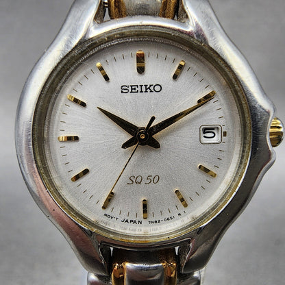 Seiko SQ 50 Watch Women 25mm White Dial Two Tone Date 7n820301 New Battery1