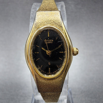 VTG Citizen CQ Watch Women 16mm Black Dial Gold Tone Oval 5930-S25350 New Batt
