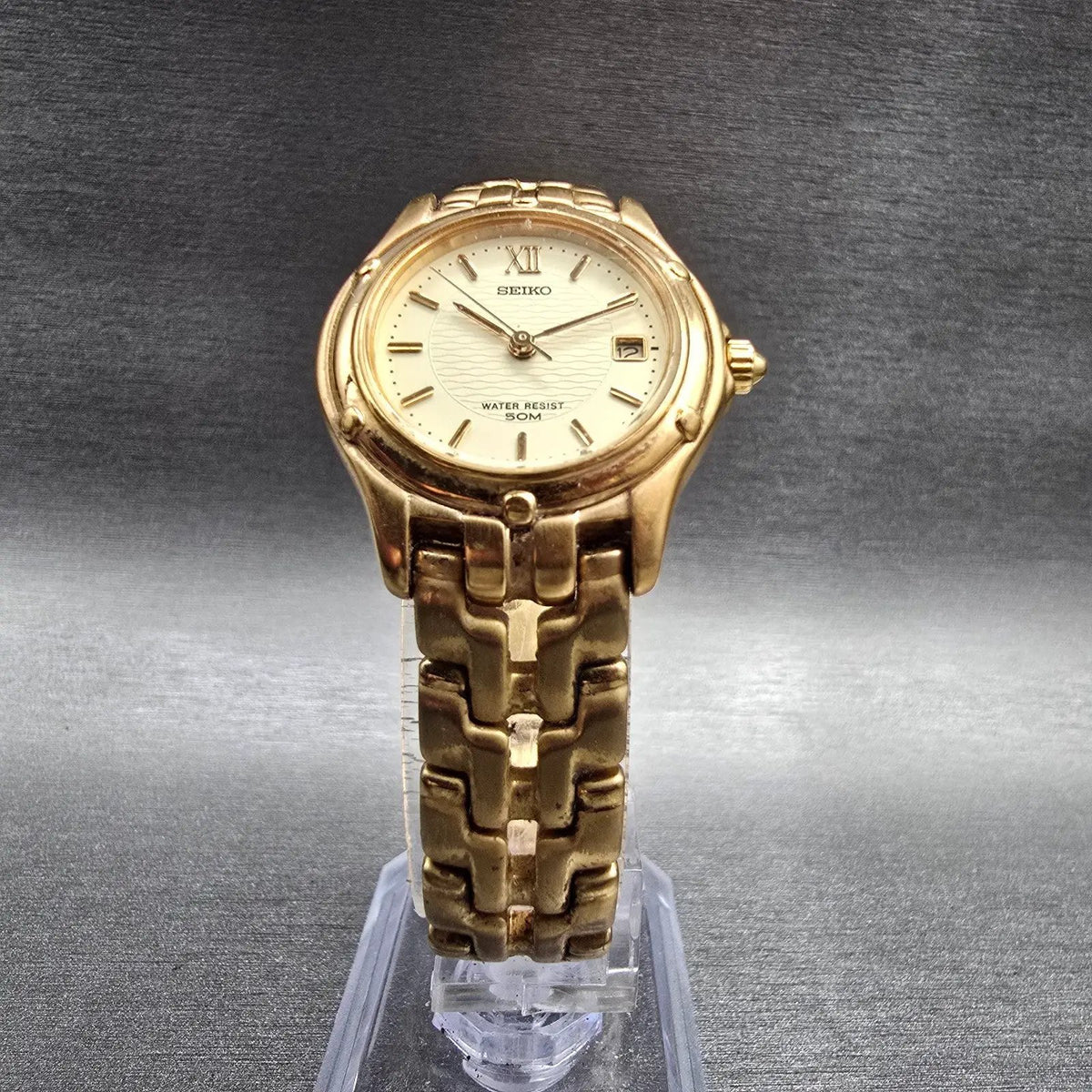 Seiko Watch Women 25mm Champagne Dial Gold Tone Date Round 7N82-0599 New Batt JP5