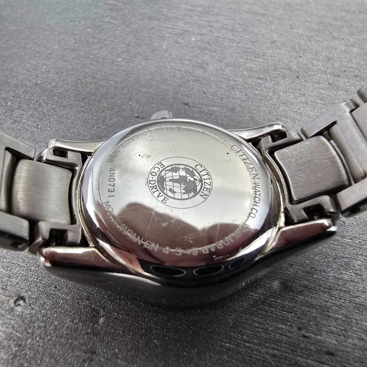 Citizen Watch Women 25mm Black Dial Silver Tone Date Round E011-S015502 Runs BG10