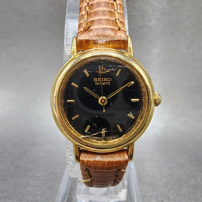 Seiko Watch Women 21mm Black Dial Gold Tone Round 1n010e20 New Battery0
