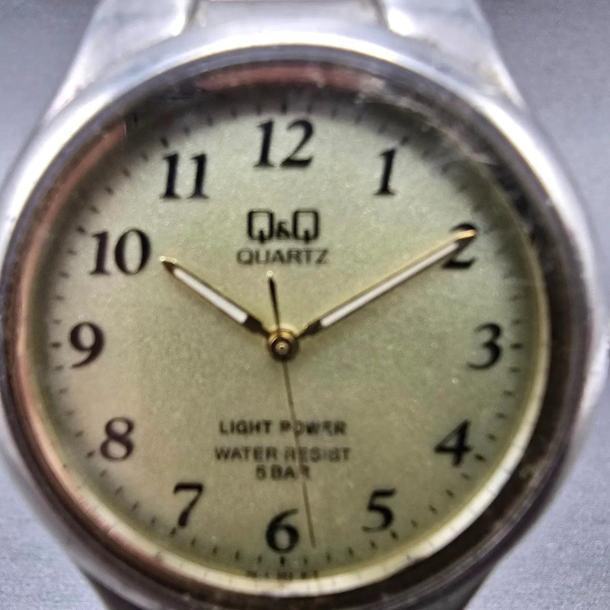 Citizen Q&Q Solar Watch Men 35mm Champagne Dial Silver Tone Round Bracelet Runs1