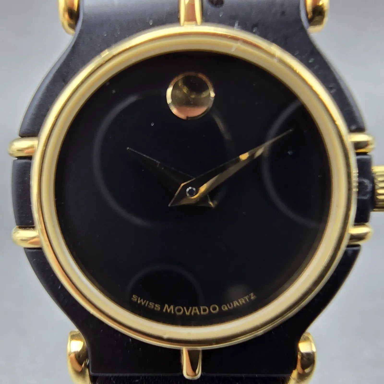 Movado Delphino Watch Women 23mm Black Dial Black & Gold Tone 80-24-822N New Bat1