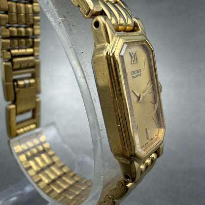 Seiko tank Watch Women 12mm Champagne Dial Gold Tone 2e20-6389 New Battery GY73