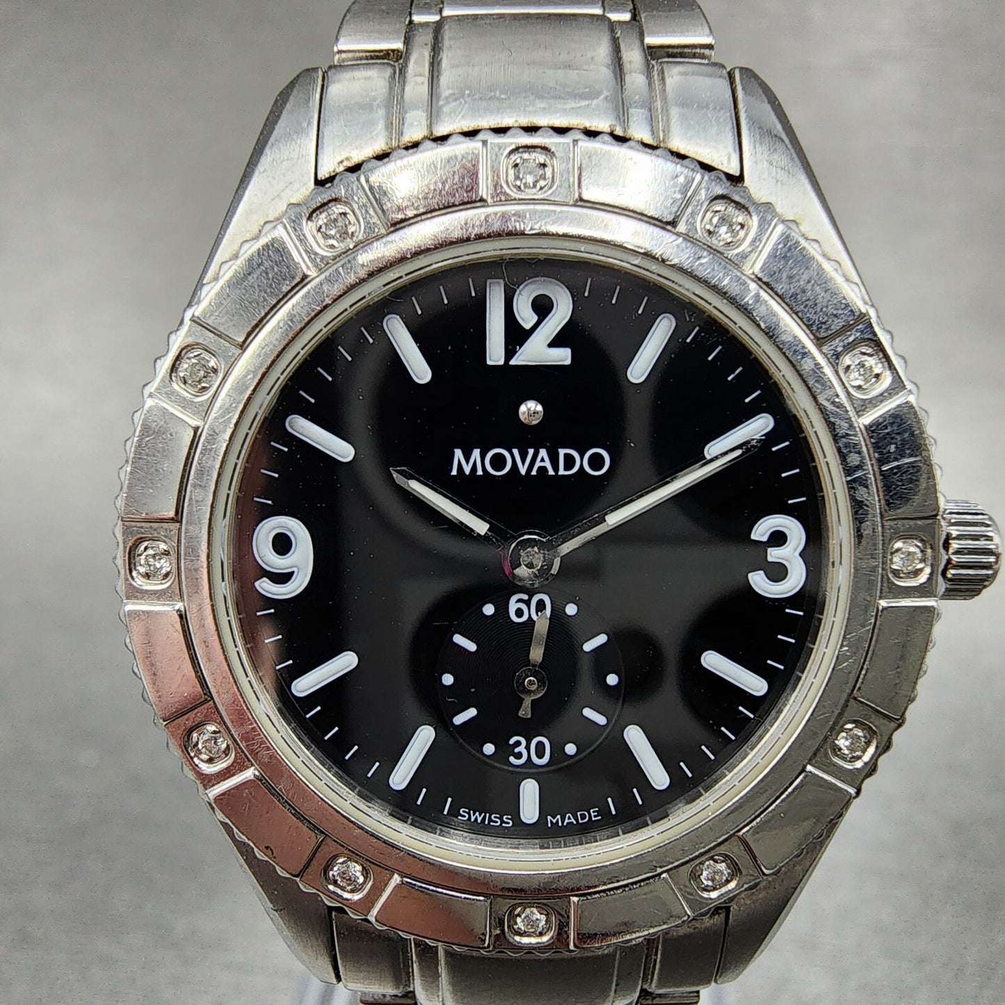Movado Gentry Watch Women 28mm Black Dial Silver Tone Round 84 E9 1860 New Batt1