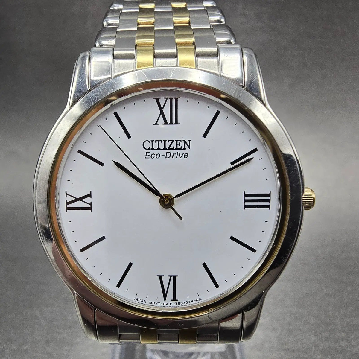 Citizen Eco-Drive Stiletto Watch Men 35mm White Dial Two Tone Round Runs WBox1